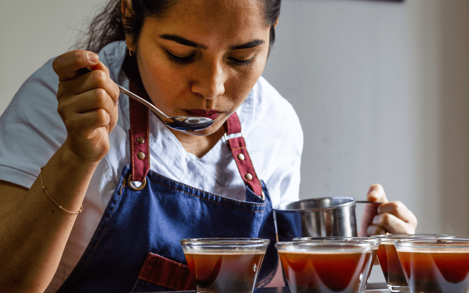 Person cupping or tasting Colombian specialty coffee